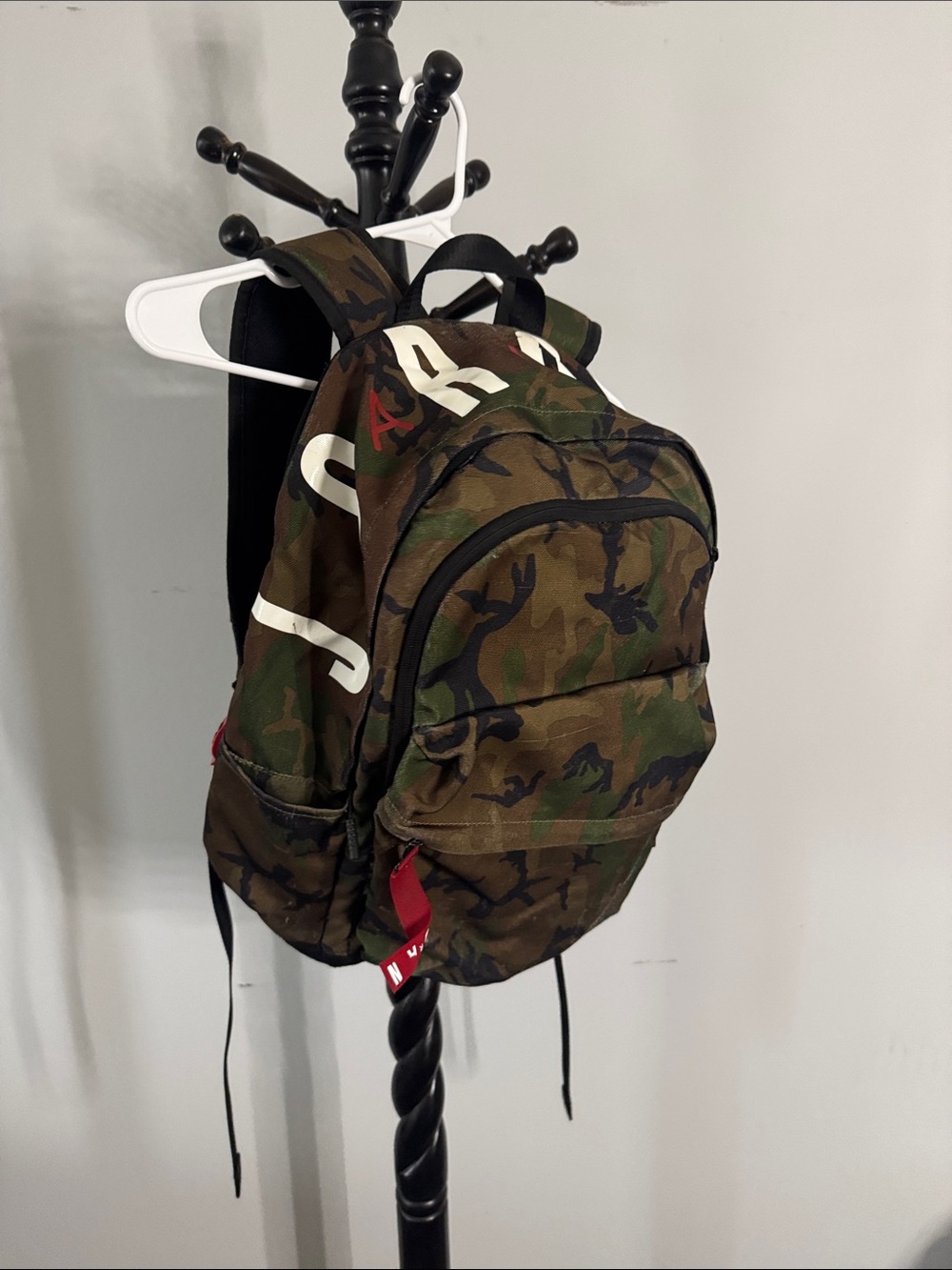 Camouflage Men's Backpack with Red Accent Pulls